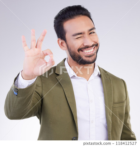 OK hand, portrait and business man isolated on a white background career, job success and agreement with wink. Like, yes and okay sign or emoji of asian person, entrepreneur or worker face in studio OK hand, portrait and business man isolated on a white background career, job success and agreement with wink. Like, yes and okay sign or emoji of asian person, entrepreneur or worker face in studio 118412527