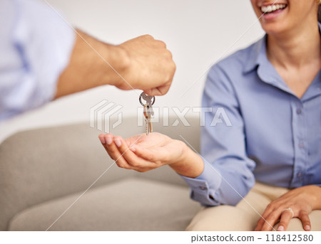Real estate, hands and giving keys to woman after moving into new home. Property agent, realtor and handing over key to happy person for sale, loan or mortgage investment in apartment, house or rent. Real estate, hands and giving keys to woman after moving into new home. Property agent, realtor and handing over key to happy person for sale, loan or mortgage investment in apartment, house or rent. 118412580