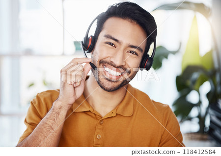 Man with smile in portrait, call center employee and contact us with headset and microphone, CRM and help desk agent. Happy male consultant, communication and tech, customer service job and telecom 118412584