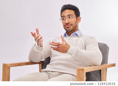 Psychologist, doctor and mental health, man in counselling session and listening with treatment on studio background. Counsellor, therapy and male with medical consultation, help and psychology 118412619