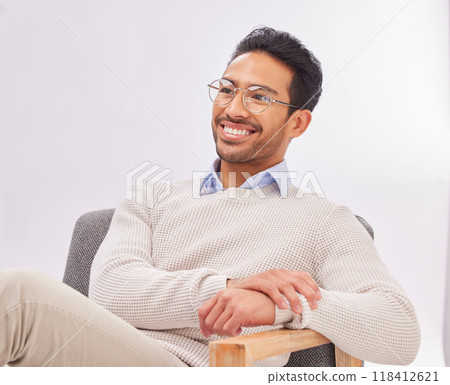Psychologist thinking, mental health and man with smile in therapy and listen with treatment on studio background. Therapist, counseling and happy male with medical consultation, help and psychology 118412621