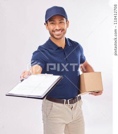 Delivery man, package in portrait and smile, clipboard for signature and box, shipping isolated on white background. Paper invoice, customer to sign and happy male in studio, logistics and service 118412708