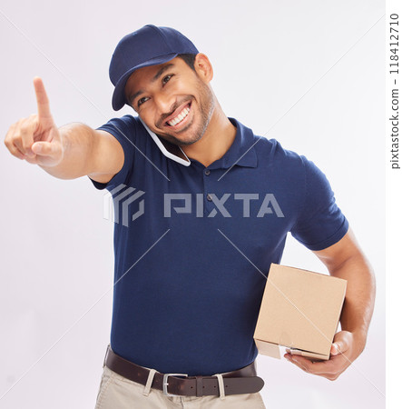 Phone call, delivery and man with box in studio isolated on a white background. Shipping, logistics and smile of happy Asian male courier with package and cellphone for ecommerce, talking or chatting 118412710