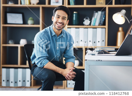 Relax, founder and portrait of entrepreneur smile and sitting in startup company office excited for the future. Young, happy and professional business man or worker feeling confident and proud Relax, founder and portrait of entrepreneur smile and sitting in startup company office excited for the future. Young, happy and professional business man or worker feeling confident and proud 118412768