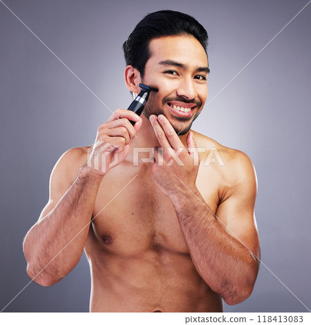 Beard hair trimmer, portrait or happy man with bathroom routine, grooming or morning smile for shaving skincare. Face cleaning, facial growth maintenance or studio person happiness on gray background 118413083
