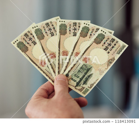Yen, money fan and hands with cash for banking, trading paper bills and economy of financial freedom. Closeup of rich investor, profit and income of japanese payment, savings and budget of accounting 118413091