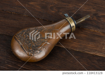 Old west gunpowder flask 118413128