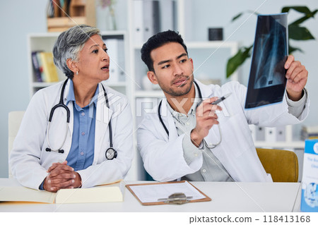 Teamwork, xray and doctors, nurses or people of healthcare research, results and analysis or solution in office. X ray review, radiology and medical woman, mentor and man talking or planning anatomy Teamwork, xray and doctors, nurses or people of healthcare research, results and analysis or solution in office. X ray review, radiology and medical woman, mentor and man talking or planning anatomy 118413168