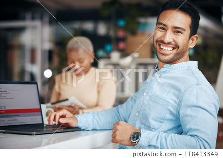 Portrait, smile and business man in office with pride for career, occupation or job. Ceo, night and happy, proud and confident Asian professional entrepreneur sitting at table with laptop in company. Portrait, smile and business man in office with pride for career, occupation or job. Ceo, night and happy, proud and confident Asian professional entrepreneur sitting at table with laptop in company. 118413349