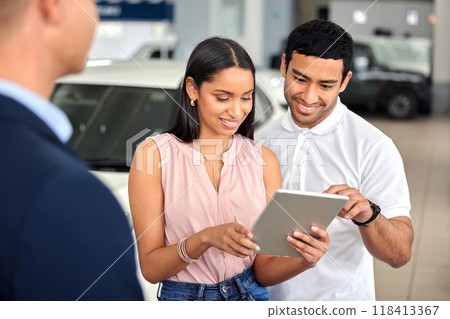 Tablet, car and showroom with couple and salesman for vehicle shopping, test drive and consulting. Auto, transportation and purchase with man and woman in dealership for insurance, sale and motor 118413367