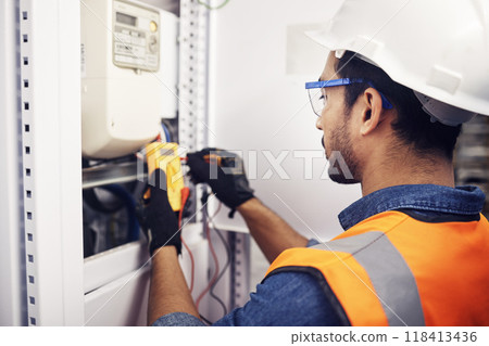 Technician, man and multimeter testing power for electricity, energy inspection and electrical system. Electrician, engineering and voltage test tool for machine, industrial mechanic and control room Technician, man and multimeter testing power for electricity, energy inspection and electrical system. Electrician, engineering and voltage test tool for machine, industrial mechanic and control room 118413436