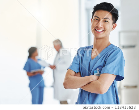 Portrait, happy man and Asian nurse with arms crossed in hospital or clinic. Face, confidence and medical professional, male surgeon or doctor with pride for career, job and healthcare for wellness. Portrait, happy man and Asian nurse with arms crossed in hospital or clinic. Face, confidence and medical professional, male surgeon or doctor with pride for career, job and healthcare for wellness. 118413628