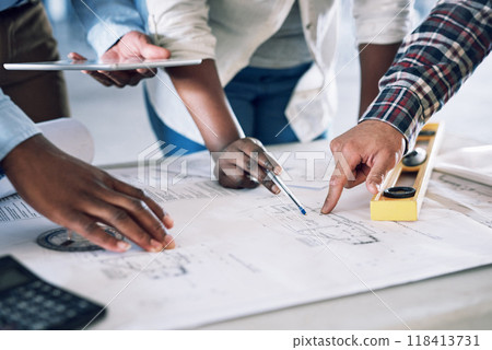 Business people, hands and architect on blueprint for construction, planning or teamwork at office desk. Hand of engineering team pointing to floor plan for architecture building or strategy on site 118413731