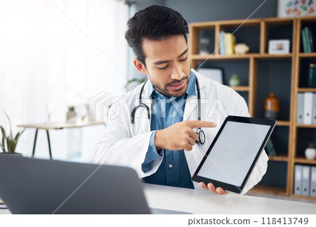 Mockup, explaining and a doctor on a video call with a tablet for results, healthcare support and advice. Talking, consulting and an Asian gp with a blank screen tech for a telehealth webinar Mockup, explaining and a doctor on a video call with a tablet for results, healthcare support and advice. Talking, consulting and an Asian gp with a blank screen tech for a telehealth webinar 118413749