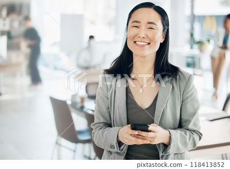 Portrait, success and Asian woman in office, smartphone and typing for social media, happiness and connection. Face, Japanese female employee and manager in workplace, cellphone and communication Portrait, success and Asian woman in office, smartphone and typing for social media, happiness and connection. Face, Japanese female employee and manager in workplace, cellphone and communication 118413852