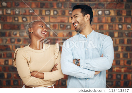 Teamwork, arms crossed and business people laughing in office workplace at funny joke or comedy. Collaboration, comic diversity and happy man and black woman together for team building and confidence 118413857