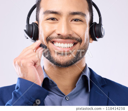 Call center portrait of happy man isolated on a white background in headset for telecom or global support. Face of international agent, consultant or salesman business person virtual career in studio 118414238