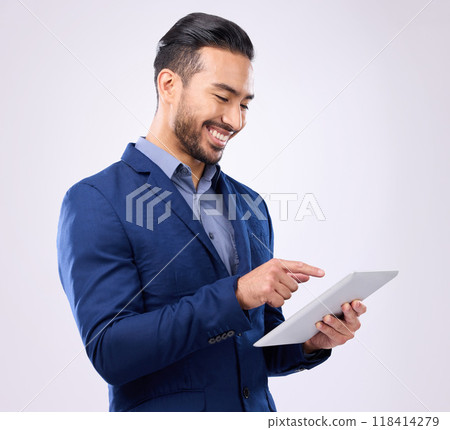 Man, business and tablet with a smile in studio for communication and network connection. Asian male model isolated on a gray background with tech for mobile app, online chat and search on internet 118414279