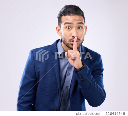 Portrait, business man and finger on lips in studio, background and privacy secret. Male employee, silence hands and quiet mouth for shush sign, gossip or whisper in silent emoji of corporate mystery Portrait, business man and finger on lips in studio, background and privacy secret. Male employee, silence hands and quiet mouth for shush sign, gossip or whisper in silent emoji of corporate mystery 118414346