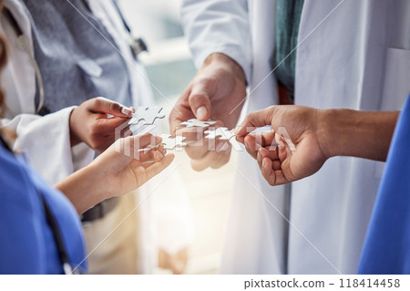 Puzzle, doctor hands or group of people teamwork, solution and healthcare goals, success or integration. Team building, game and clinic of nurse, medical men or women problem solving or collaboration Puzzle, doctor hands or group of people teamwork, solution and healthcare goals, success or integration. Team building, game and clinic of nurse, medical men or women problem solving or collaboration 118414458