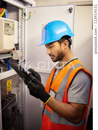 Tablet, engineering and man with electricity box for repair, maintenance and technician inspection. Industrial, electrician and male worker on digital tech for service, test or power source check Tablet, engineering and man with electricity box for repair, maintenance and technician inspection. Industrial, electrician and male worker on digital tech for service, test or power source check 118414531