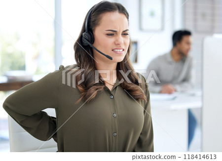 Call center, back pain and woman, agent or consultant on computer for burnout, health problem and stress. Telecom, customer support and agency worker or young person, spine or muscle injury at desk Call center, back pain and woman, agent or consultant on computer for burnout, health problem and stress. Telecom, customer support and agency worker or young person, spine or muscle injury at desk 118414613