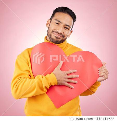 Heart, poster and love with portrait of man in studio for romance, date and valentines day. Kindness, support and hope with person and sign on pink background for wellness, peace and creative mockup Heart, poster and love with portrait of man in studio for romance, date and valentines day. Kindness, support and hope with person and sign on pink background for wellness, peace and creative mockup 118414622