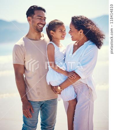 Happy family, beach and hug of a mother, father and girl together by the ocean. Nature, sea and love of a mom, dad and child from the Philippines on a vacation with parents on travel holiday 118414810