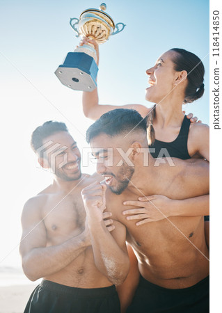 Celebration, winning and volleyball team on the beach with a trophy for goals, success or achievement. Happy, celebrate and group of athletes in unity together by ocean or sea on summer weekend trip. 118414850