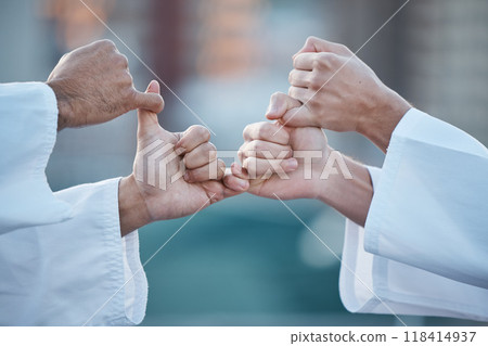 Hands, karate and grip with sports people fighting outdoor in a competition, battle or combat. Fitness, self defense and thumb war with athletes wrestling while training for martial arts together 118414937