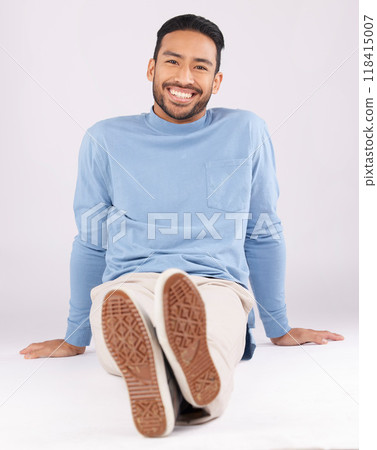 Portrait, fashion and man smile on the floor in studio isolated on a white background. Style, happy and Asian person from Cambodia in casual clothes, trendy aesthetic or confidence to relax on ground Portrait, fashion and man smile on the floor in studio isolated on a white background. Style, happy and Asian person from Cambodia in casual clothes, trendy aesthetic or confidence to relax on ground 118415007