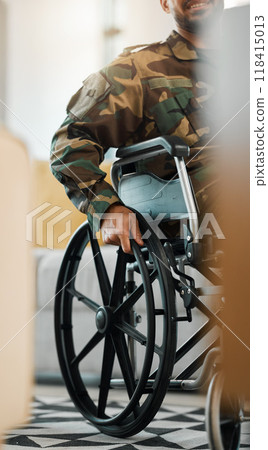 Military, city and a man from the army in a wheelchair, war injury or rehabilitation. Hands, support and a person, soldier or hero with a disability as a veteran in mobility recovery in the street 118415013