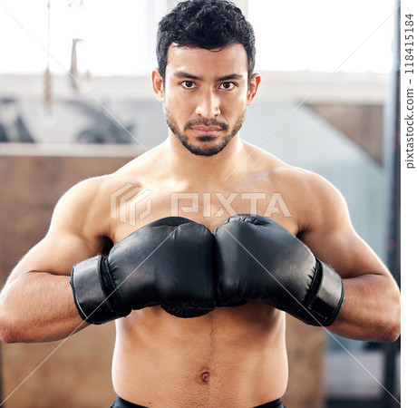Portrait, boxer and serious man in gym for exercise, battle and training for fight. Face, boxing and male athlete, fighter or sports person workout, fitness and practice for martial arts challenge. Portrait, boxer and serious man in gym for exercise, battle and training for fight. Face, boxing and male athlete, fighter or sports person workout, fitness and practice for martial arts challenge. 118415184