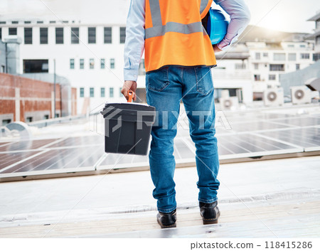 Tool box, construction worker and back with solar panel maintenance and labor outdoor. Roof, eco engineer and green energy project with builder and sustainability contractor with building project Tool box, construction worker and back with solar panel maintenance and labor outdoor. Roof, eco engineer and green energy project with builder and sustainability contractor with building project 118415286