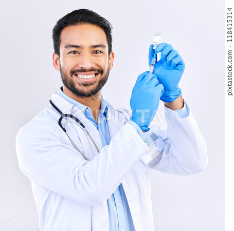 Portrait of doctor with smile, syringe and vaccine in studio for healthcare, medicine and innovation in medical science. Vaccination, booster shot and Indian man, virus protection on white background Portrait of doctor with smile, syringe and vaccine in studio for healthcare, medicine and innovation in medical science. Vaccination, booster shot and Indian man, virus protection on white background 118415314