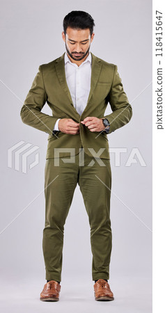 Fashion, business and man tie suit button on white background for success, leadership and confidence. Corporate style, manager and male model with trendy, formal and professional clothes in studio Fashion, business and man tie suit button on white background for success, leadership and confidence. Corporate style, manager and male model with trendy, formal and professional clothes in studio 118415647