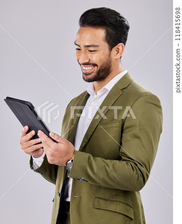 Asian man, search or digital tablet on isolated studio background for finance app, fintech investment or insurance budget. Smile, happy or businessman on technology for stock market or savings growth 118415698