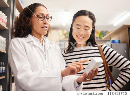 Happy woman, medicine shopping or pharmacist in reading retail healthcare supplements information. Pharmacy or doctor helping Asian customer with store medication advice, pills box or medical drugs 118415720