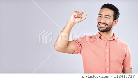 Young man, supplement pill and smile by studio mockup space for health, self care or wellness. Gen z model, student and medicine for nutrition, diet or omega 3 for healthy brain, mindset and happy Young man, supplement pill and smile by studio mockup space for health, self care or wellness. Gen z model, student and medicine for nutrition, diet or omega 3 for healthy brain, mindset and happy 118415727