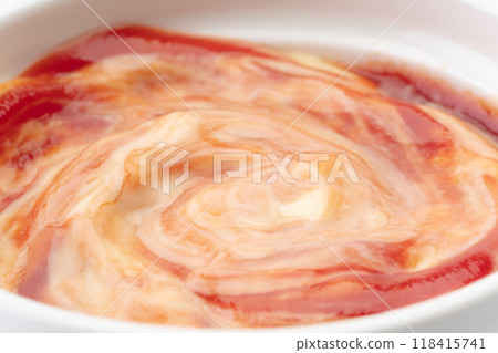 Aurora sauce made by mixing ketchup and mayonnaise Aurora sauce made by mixing ketchup and mayonnaise 118415741