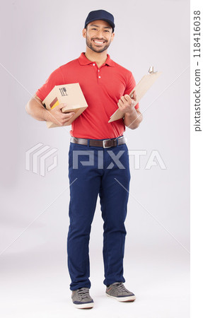 Asian man, portrait and box with clipboard in delivery, signature or checklist against a grey studio background. Male person smile in supply chain, logistics or courier service with parcel or package 118416038