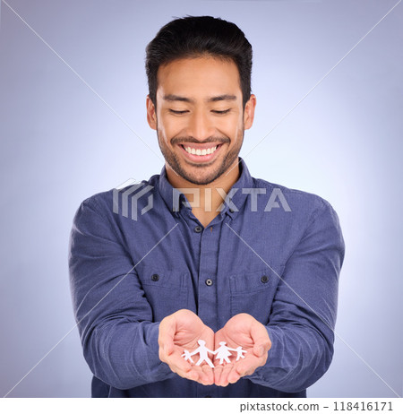 Family, paper cutout in hands and man, smile with foster care and respect with trust on studio background. Happy male, connection and love with link, wellbeing of kids with adoption and parenthood Family, paper cutout in hands and man, smile with foster care and respect with trust on studio background. Happy male, connection and love with link, wellbeing of kids with adoption and parenthood 118416171