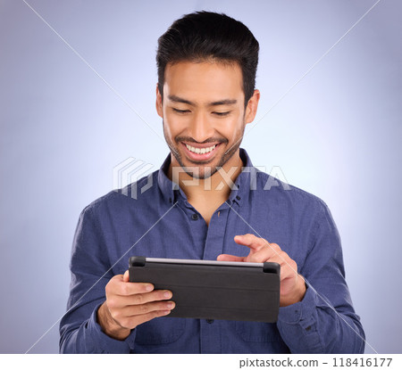 Happy business man on tablet isolated on studio background for stock market research with online app. Happy asian person, worker or entrepreneur on digital technology for profit, sales and fintech 118416177
