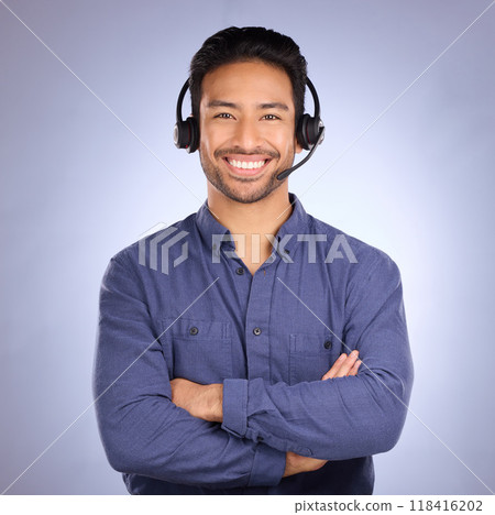 Arms crossed, call center and smile with portrait of man for customer service, business and technical support. Networking, communication and contact us with employee for sales, crm or happy in studio 118416202