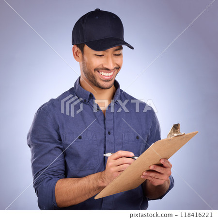 Man, studio and writing on clipboard working on delivery, shipping and logistics with hat and smile. Happy asian model person or worker on checklist, list or form for information on purple background Man, studio and writing on clipboard working on delivery, shipping and logistics with hat and smile. Happy asian model person or worker on checklist, list or form for information on purple background 118416221