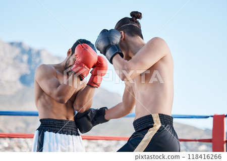 Punch, boxing match or men fighting in sports training, exercise or fist punching with strong power. Fitness action, boxers or combat fighters boxing in practice workout in ring on rooftop in city 118416266