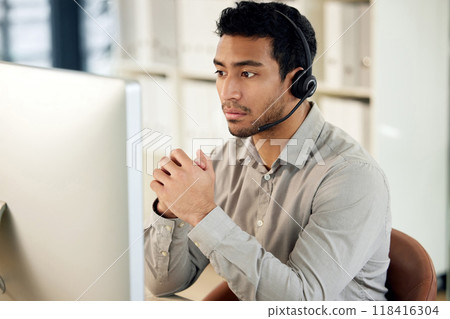Man at computer, call center and headset with contact us, communication and CRM with tech support. Customer service, help desk and telemarketing with serious male consultant and professional service Man at computer, call center and headset with contact us, communication and CRM with tech support. Customer service, help desk and telemarketing with serious male consultant and professional service 118416304