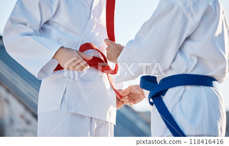 Karate, belt and people outdoor for training, workout or fitness achievement in city. Martial arts, sports and coach with student for taekwondo competition, battle and challenge to fight or exercise 118416416