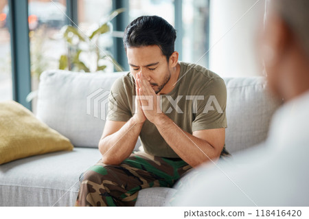Stress, soldier and man in therapy for trauma counseling due to military war and talking army mental health support. Consultation, depression and sad man with help for psychology problem on a sofa 118416420