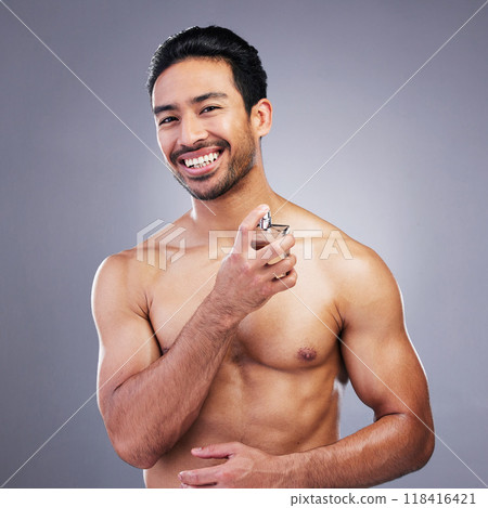 Portrait, perfume or happy man with cologne for beauty or self care isolated on studio background. Wellness, topless or Asian model with luxury body partume spray with fragrance bottle for grooming 118416421